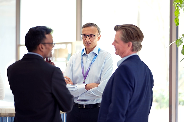 Attendees networking at eClerx Investor Day 2026